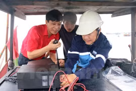 Coastal fishermen presented with communication devices 