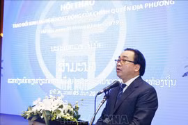 Vietnam, Laos share experience in local government activities