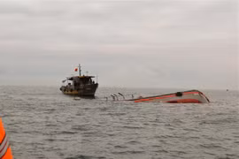 Crew of capsized fishing boat rescued at sea