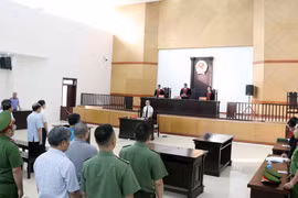 Two former public security officers have jail sentences reduced