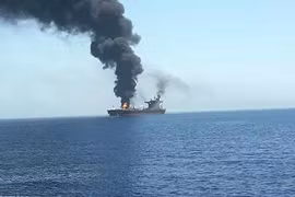 Indonesia looks for missing victims of burning ship 