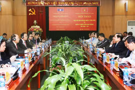 Vietnam, Laos share experience in managing local administrations