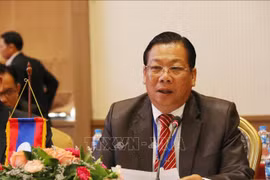 Vietnam, Laos review crime fight 