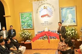 Nepali PM witnesses release of book on peace and Buddhism 