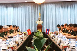 Vietnam, Laos hold first defence policy exchange 
