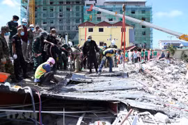 Cambodia arrests four suspects in building collapse