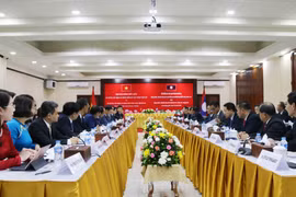 Government Offices of Vietnam, Laos step up cooperation