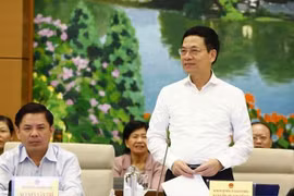 MIC leader answers deputies’ questions at NASC’s 36th session