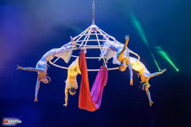 A performance “Du non 4 nu” (four female artists swing on conical hat) of the Vietnam Circus Federation (VCF). (Photo courtesy of Vietnam Circus Federation)
