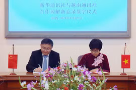 VNA, Xinhua enhance information cooperation