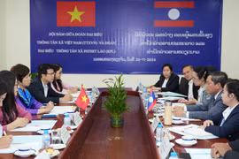 At the talks between General Director of the Vietnam News Agency (VNA) Vu Viet Trang and General Director of the Lao News Agency (KPL) Vannasin Simmavong. (Photo: VNA)