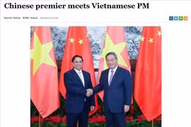 Prime Minister Pham Minh Chinh (L) and Chinese Premier Li Qiang (Photo: Xinhua)