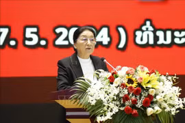 Vice President of Laos Pany Yathotou speaks at the meeting. (Photo: VNA)