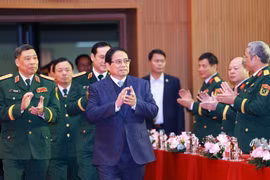 PM Pham Minh Chinh visits the National Defence Academy on December 12. (Photo: VNA)