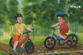 Message from murals in small Hanoi alley