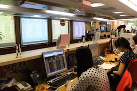 Shares mixed as property firms weigh