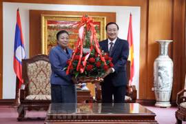 Laos proud at achievements of Communist Party of Vietnam: Lao officials