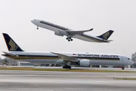 Singapore Airlines to cut flights