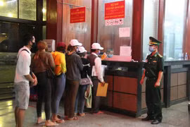 Vietnamese, Lao provinces enhance coordination in fighting COVID-19