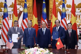Vietnam, Malaysia ink cooperative deals