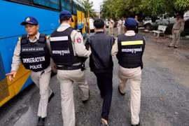 Cambodia arrests nearly 400 suspects over telecoms fraud