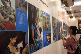 Photo exhibition portrays beauty of breastfeeding