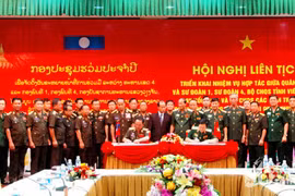 Vietnam’s Military Zone 4, Laos’s military build peace border 