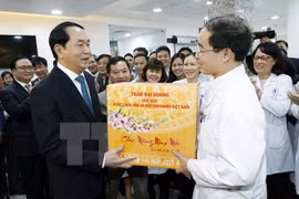President Tran Dai Quang visits on-duty forces on Eve night