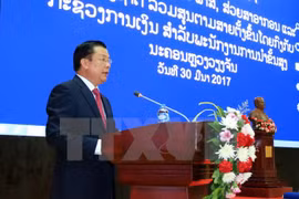 Vietnam, Laos talk financial management experience