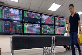 Shares slide on profit-taking selling