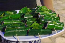Pork in grapefruit leaves: a Muong delicacy