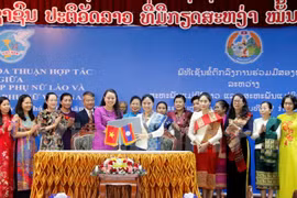 Women’s Unions of Vietnam, Laos seek to foster cooperation 