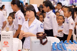 Laos to provide free health care for children