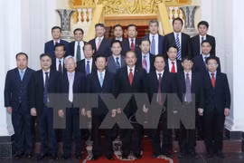 Lao delegation to fifth theoretical workshop greeted in Kien Giang 