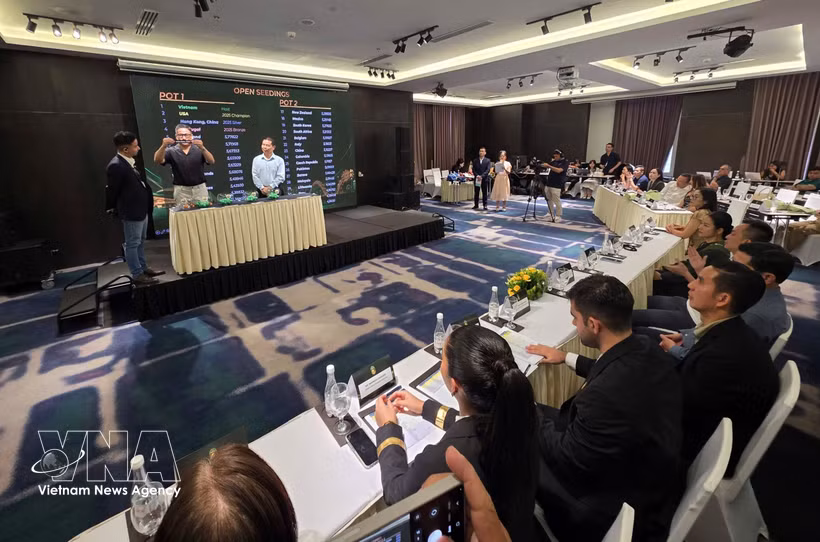 Delegates at the tournament’s group-stage draw ceremony. (Photo: VNA) 