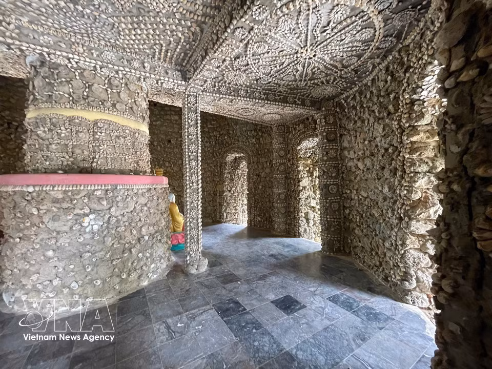 Patterns made from seashells and shell fragments adorn Bao Tich tower. (Photo: VNA)
