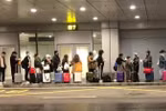 Passengers have samples taken for COVID-19 testing right at airports