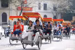 Tourists take a street tour on pedicabs in Hanoi. (Photo: VNA)