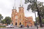 The Notre Dame Cathedral in HCM City's downtown is an ideal place for people to gather, especially at weekends. (Photo: VNS)