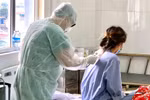 Doctors take care of COVID-19 patients