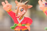 Artisan makes SEA Games mascots from jackfruit wood
