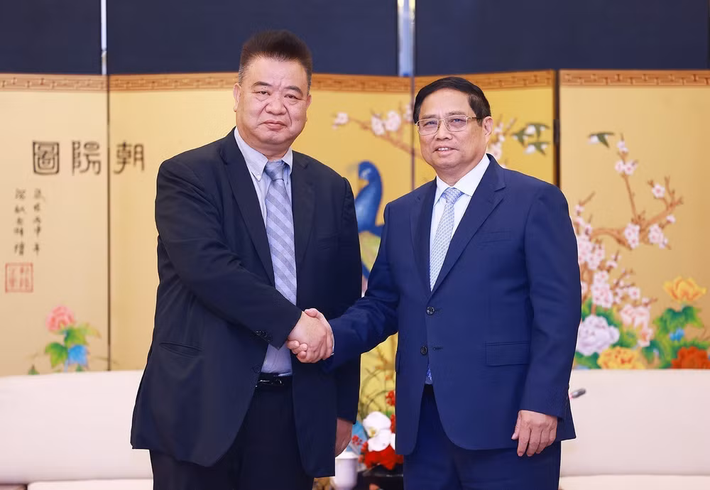 PM Pham Minh Chinh receives Chinese aviation, agriculture firms 2.jpg