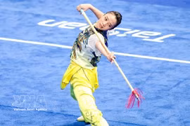 Duong Thuy Vi wins her first-ever gold medal at the fourth Wushu Taolu World Cup in China. (Photo: VNA)