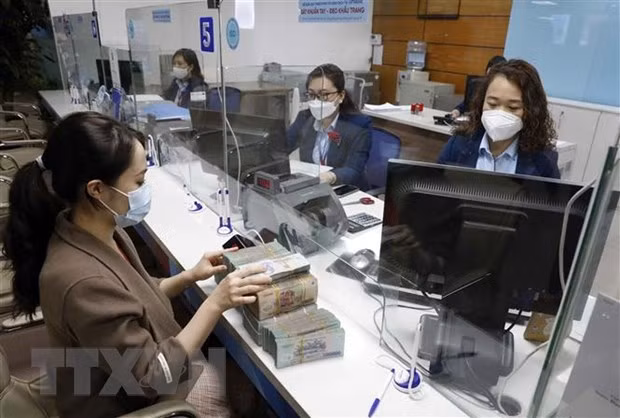 Reference exchange rate up 23 VND ảnh 1