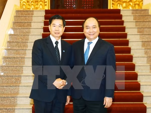 PM hails Hanoi – Vientiane cooperation ảnh 1