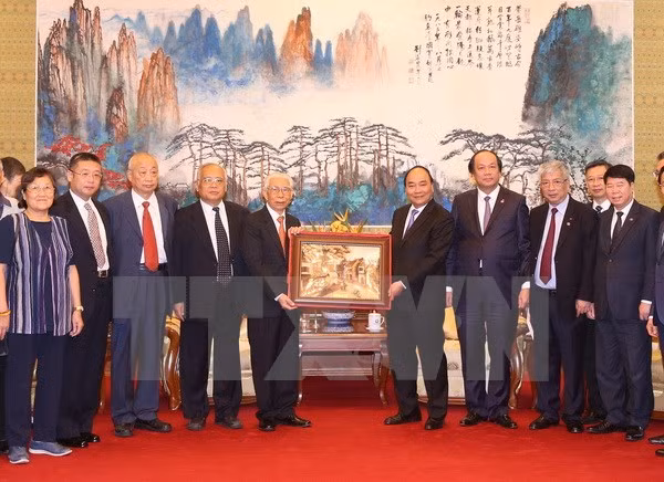 Vietnam appreciates Chinese former experts’ help: PM ảnh 1