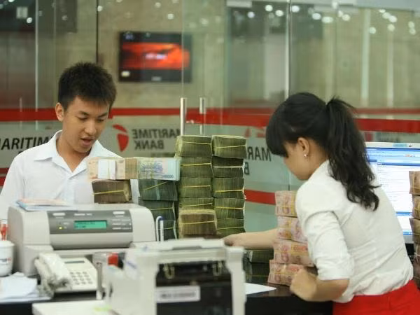 Reference exchange rate up 4 VND ảnh 1