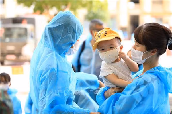 Joint efforts made to care for children affected by COVID-19 ảnh 1
