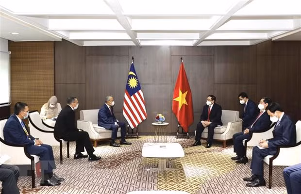 PM meets Cambodian, Singaporean, Malaysian counterparts ảnh 3 PM meets Cambodian, Singaporean, Malaysian counterparts ảnh 3