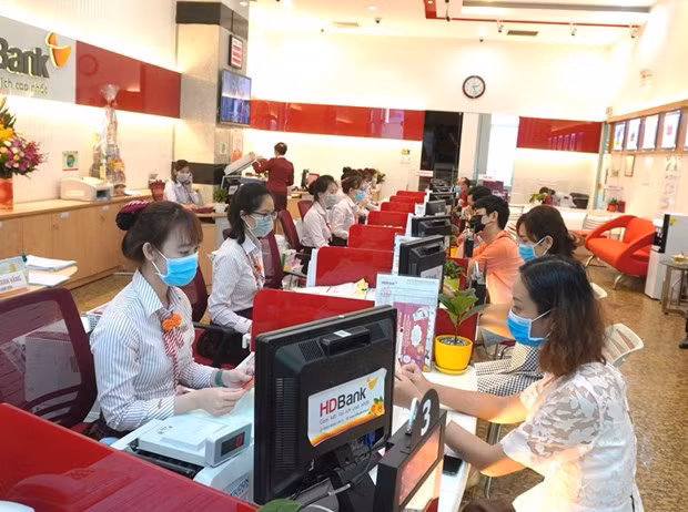 Reference exchange rate down 12 VND at week’s beginning ảnh 1 Reference exchange rate down 12 VND at week’s beginning ảnh 1